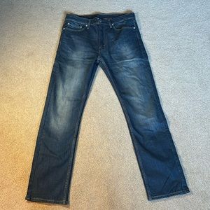 Levi’s dark blue jeans. Size 34 W / 32L.